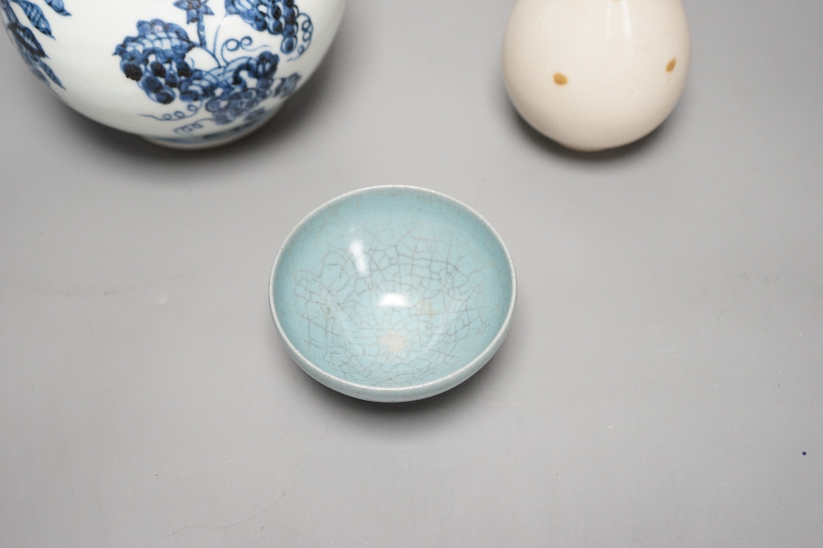 A Chinese blue and white double gourd vase, a Jun-type cup and a small baluster vase